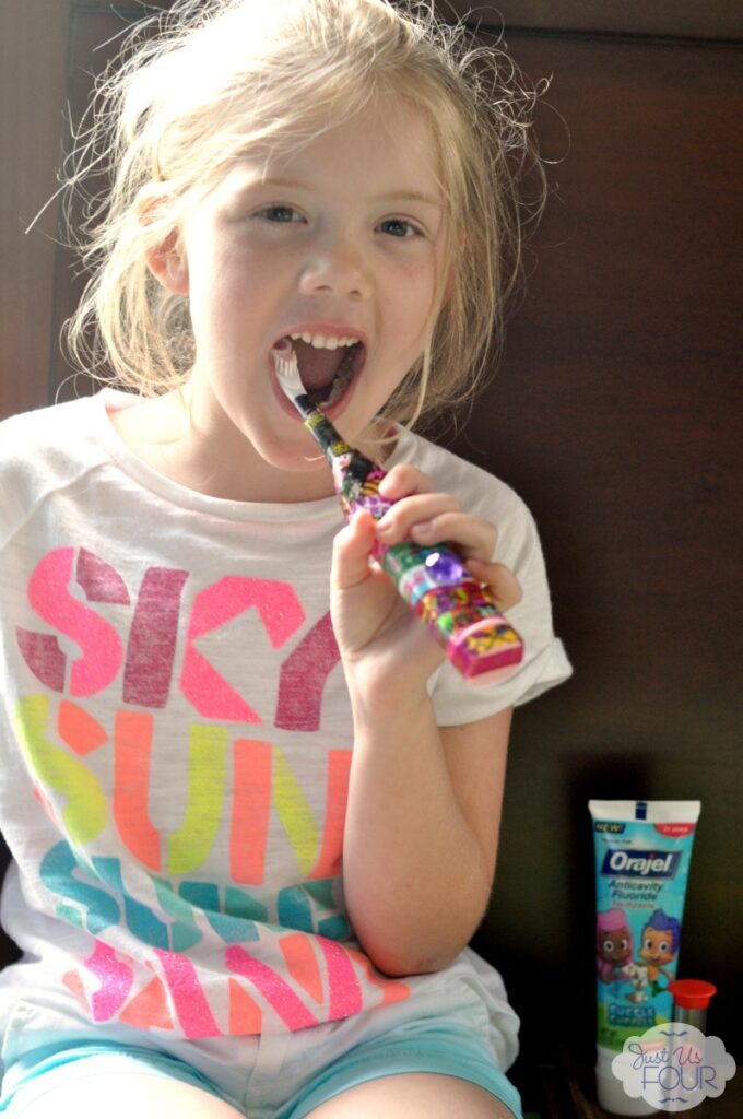 orajel-h-brushing-teeth-2_wm