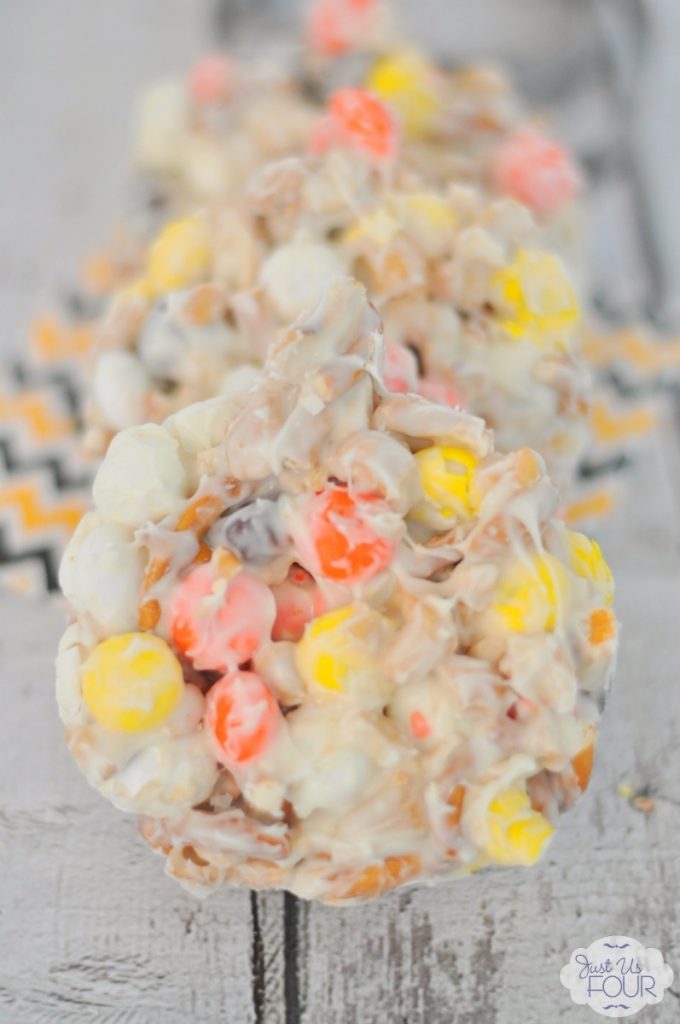 Yummy! Pretzels, cashews & M&Ms drenched in white chocolate. Bring on the Halloween "trash"
