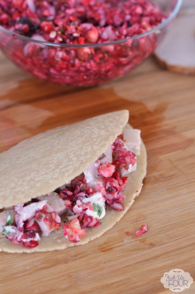 Oh yum! Turkey tacos with cranberry salsa...I will make these even when I don't have leftover turkey from Thanksgiving to use.