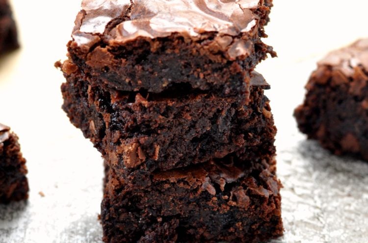 Photo of mint chocolate brownies on wood surface