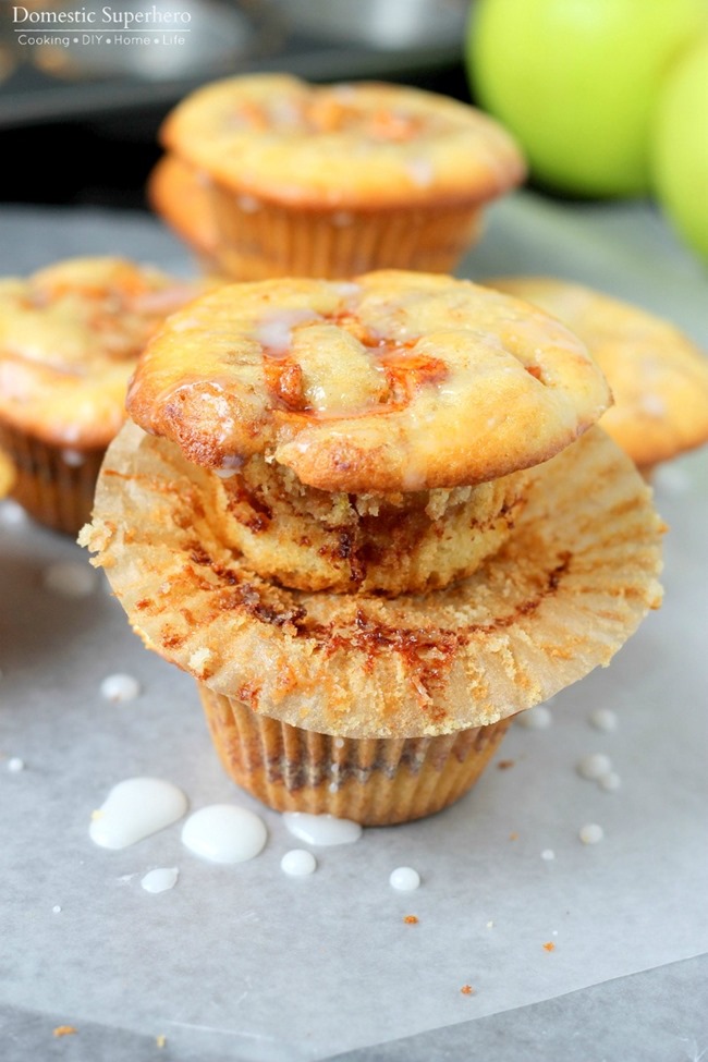 Baked Apple Fritter Muffins are filled with delicious tender apples, brown sugar, and topped with a dreamy glaze. Perfect option for baking, not frying!