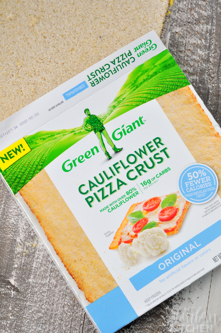 Overhead photo of cauliflower pizza crust with packaging