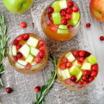 Overhead photo of three glasses of holiday sangria