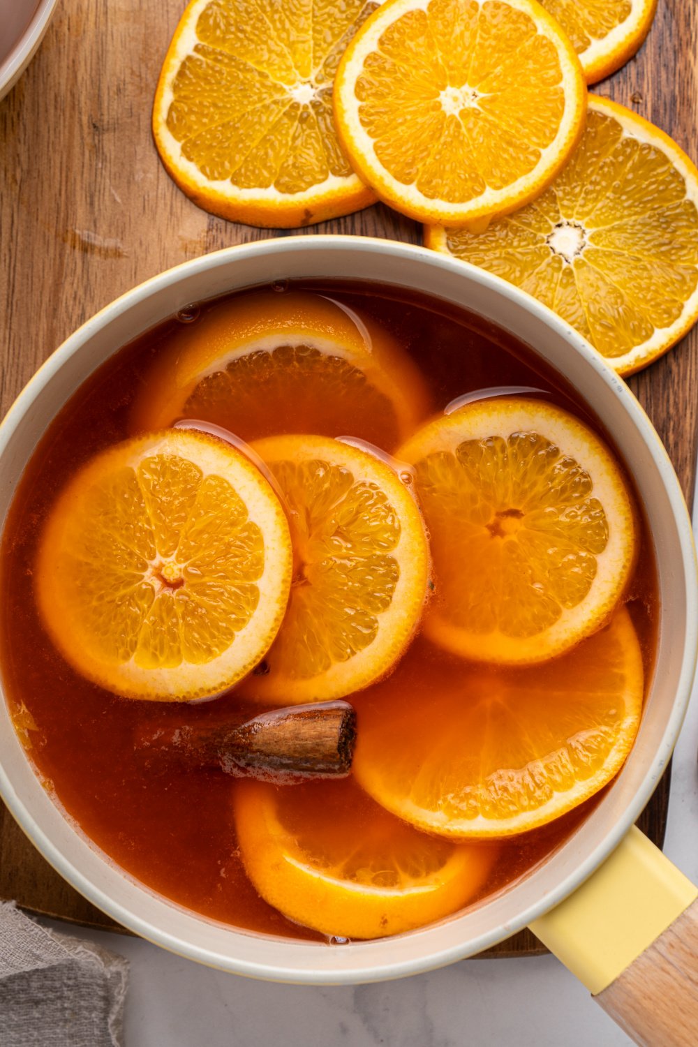 overhead photo of hot Aperol in a sauce pan