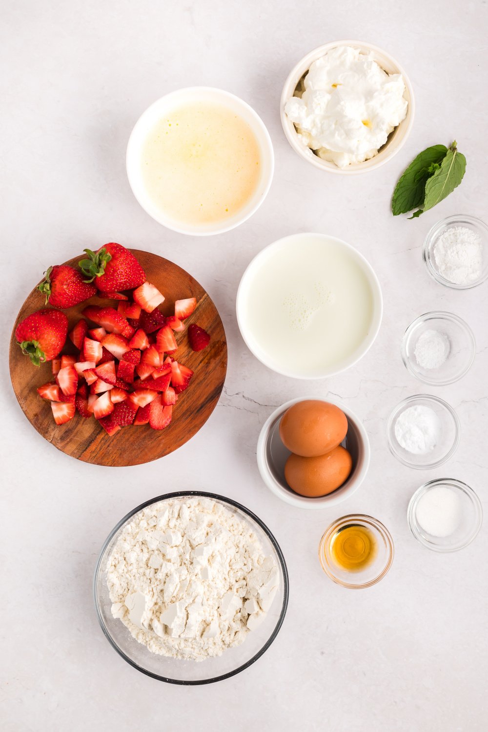 Overhead photo of ingredients needs to make waffles with strawberries