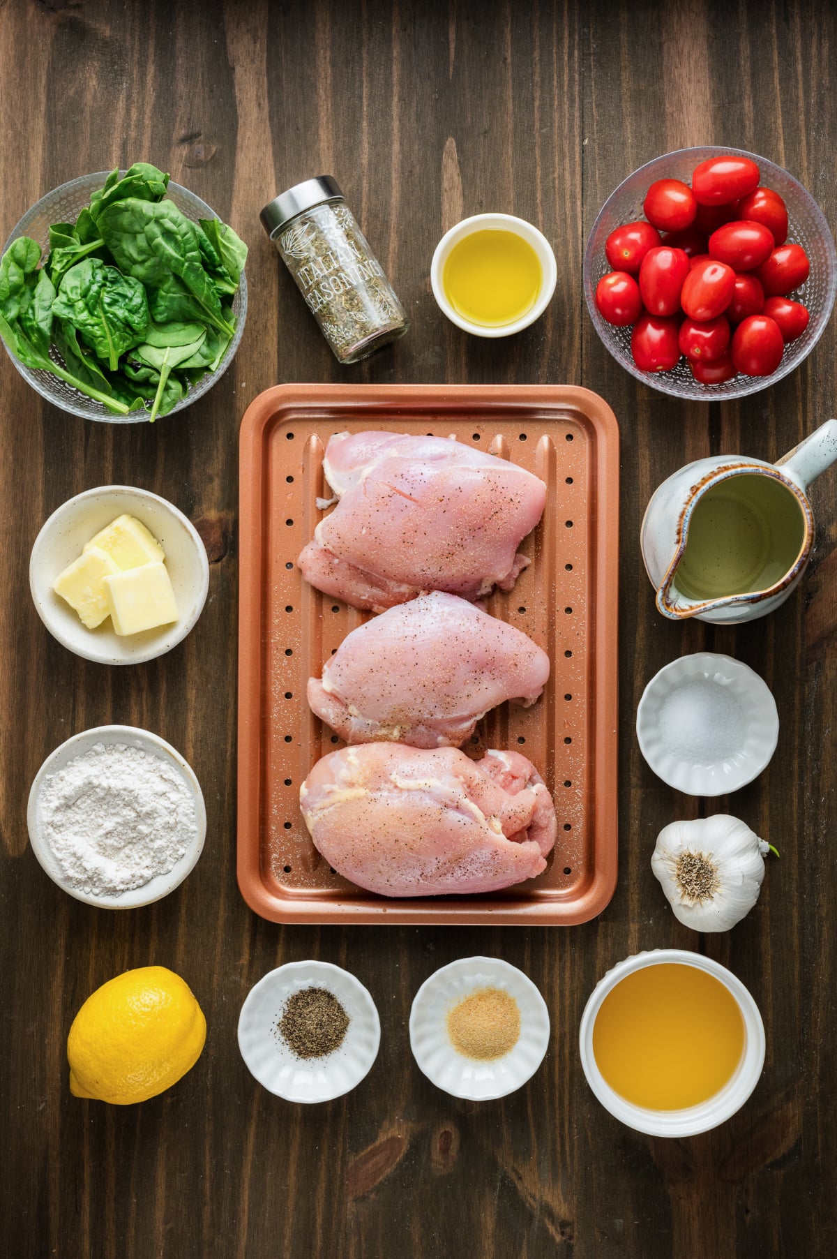 Ingredients for one pan chicken with spinach and tomatoes